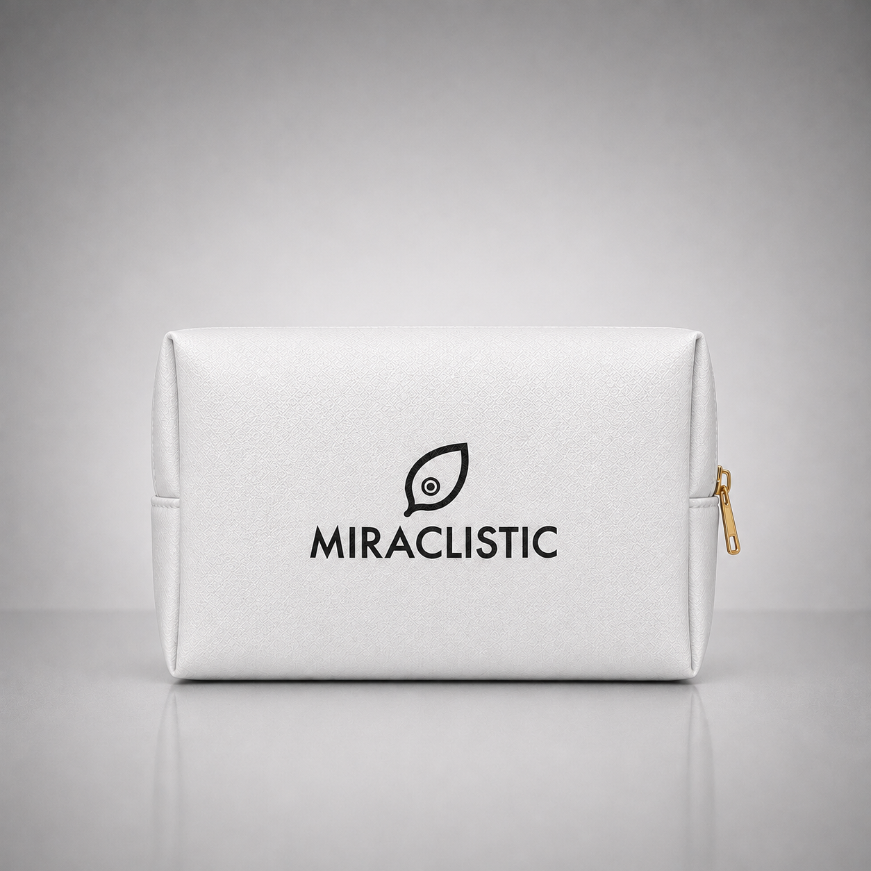 MIRACLISTIC white personal car essential kit pouch on a grey background